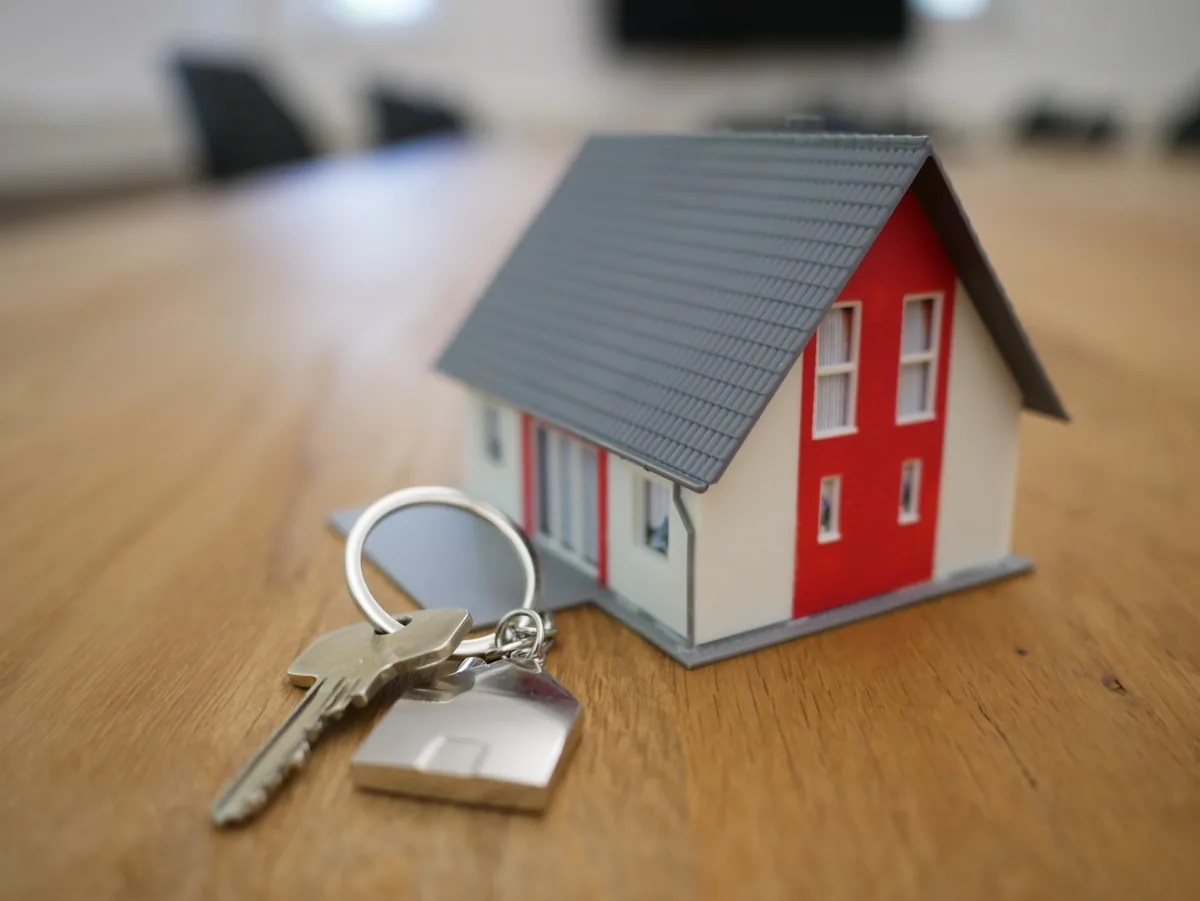 Model house and a set of keys representing a property to rent out